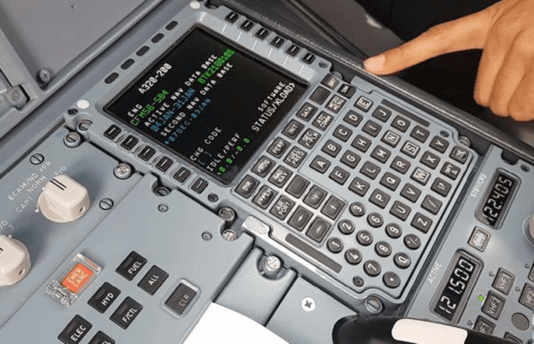 Prior to departure, what data is typically entered into the Flight Management System (FMS) as part of the pre-flight setup?