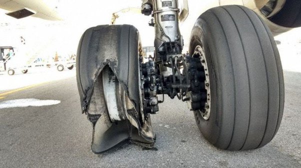 How often do aircraft tyres burst upon landing? How dangerous is it usually, when it happens?