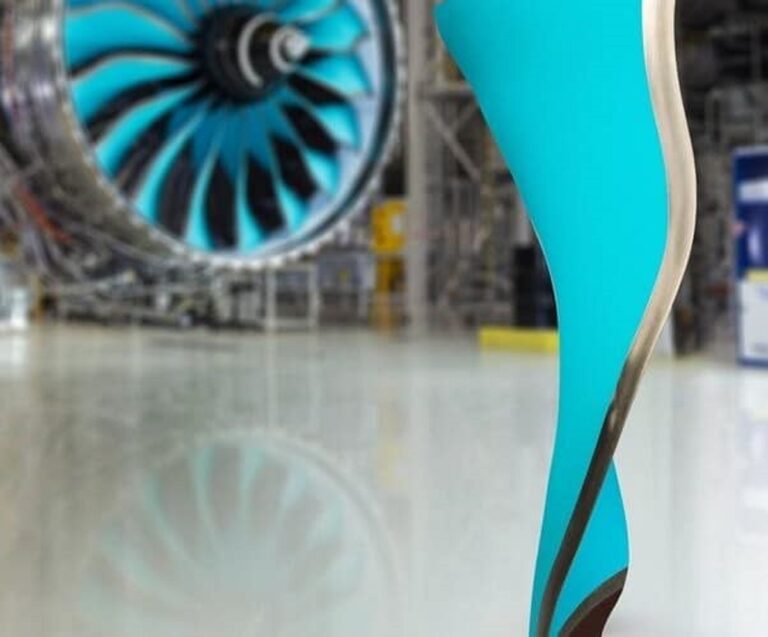 Why do jet engine fan blades have a curved and twisted shape?