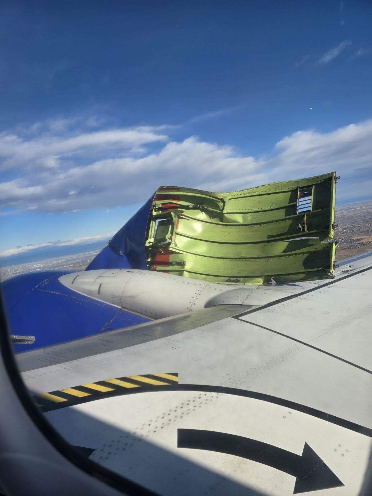 Southwest B738 at Denver on Apr 7th 2024, dropped engine doors, flap damage