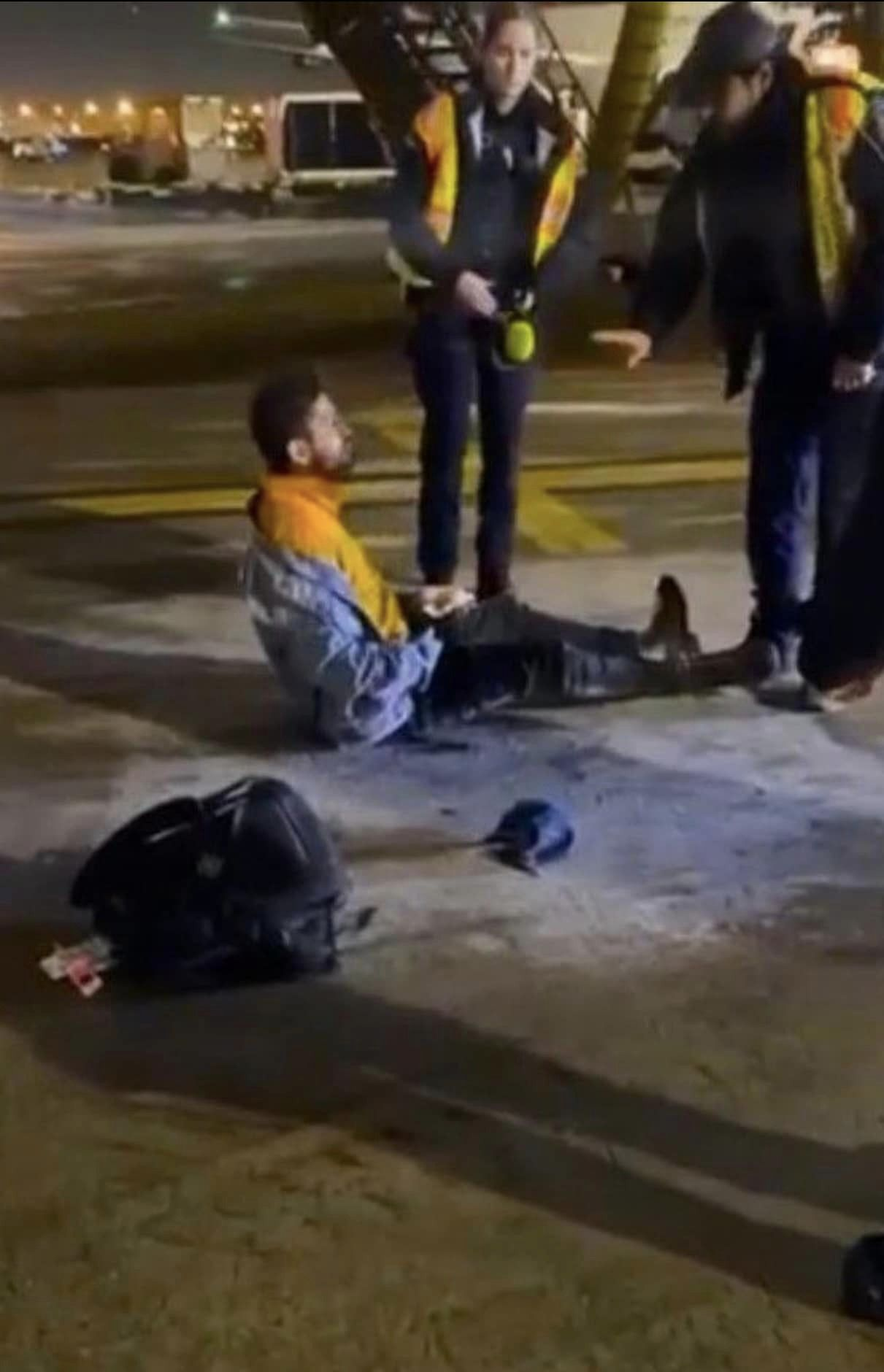 A passenger boarded a B777, then opened a door and fell out of the plane