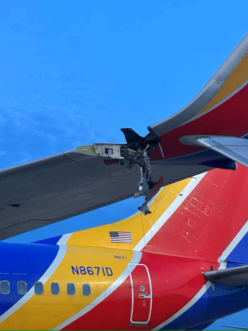Plane damaged after hitting light pole at JIA