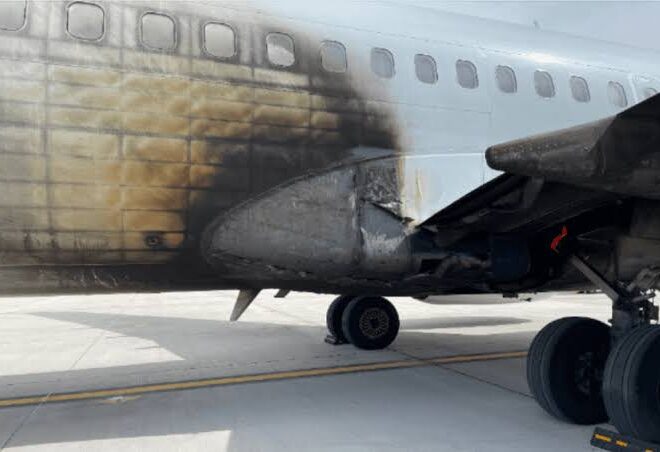American Airlines Boeing 737-800 Incident at Denver: NTSB Report Reveals Fuel Leak and Emergency Slide Failure